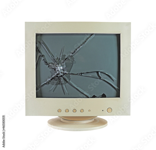  Broken monitor old computer isolated on white background, kinescope, glass, cracks, display photo