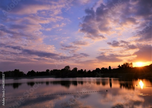 Beautiful purple sunset on the lake