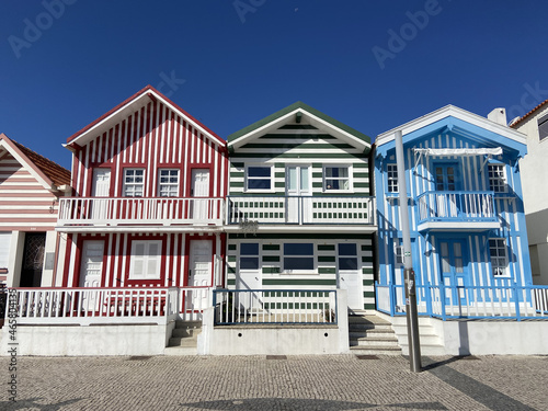 View of the house facades against the background of blue sky. Costa Nova, Aveiro, Portugal.