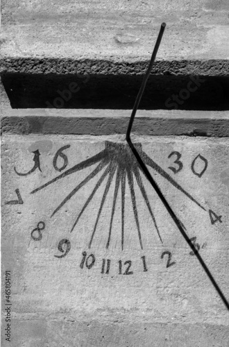 an old sundial on the wall