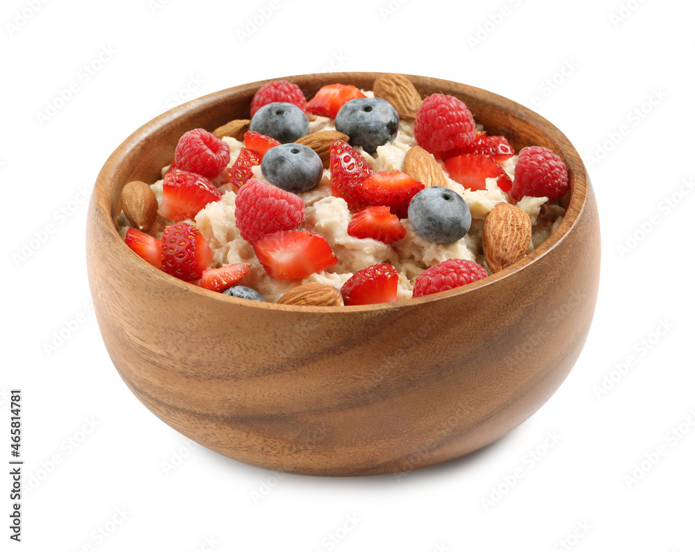 Tasty oatmeal porridge with berries and almond nuts in bowl on white background Tasty oatmeal porridge with berries and almond nuts in bowl on white background