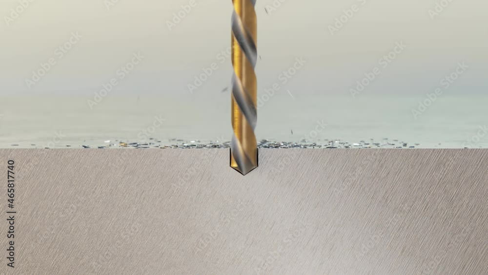 Drilling a hole in a metal surface. Spinning drill beet among metal