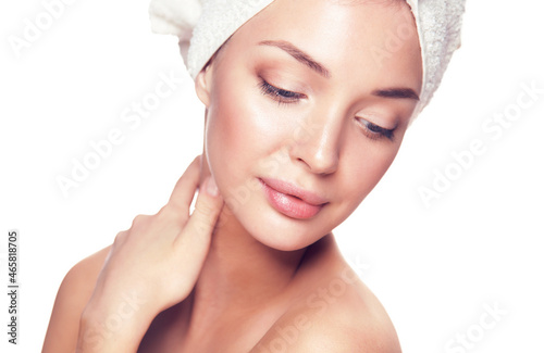 Beautiful woman with a towel on his head