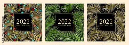 Vector set 2022 Happy New Year. Tropical card for your design. Branches of a palm tree with a Christmas garland. 