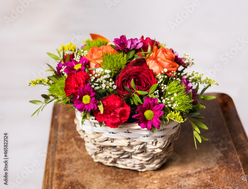 Little bouquet of beautiful flowers lying on a chair