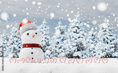 snowman with candy canes in a snowy landscape © Antonio Solano