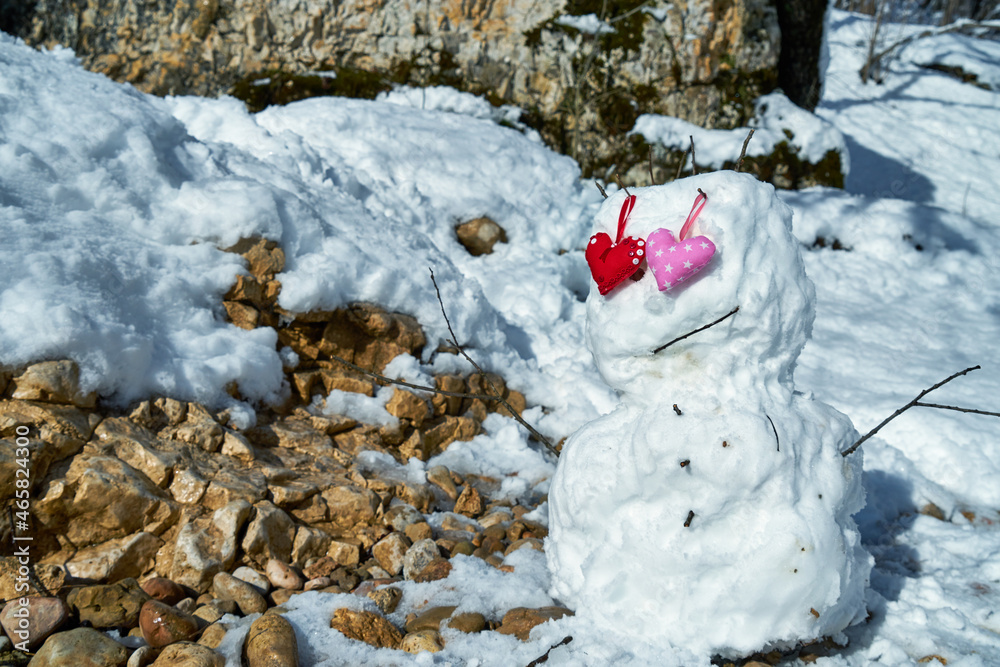 Image of soft toys in the snow. Handmade.