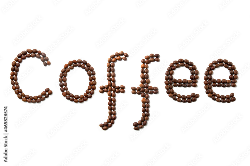 The word Coffee, made from roasted coffee beans on a white isolated background. Lettering made from coffee. Flat lay. The word Coffee, made from roasted coffee beans on a white isolated background. Lettering made from coffee. Flat lay.