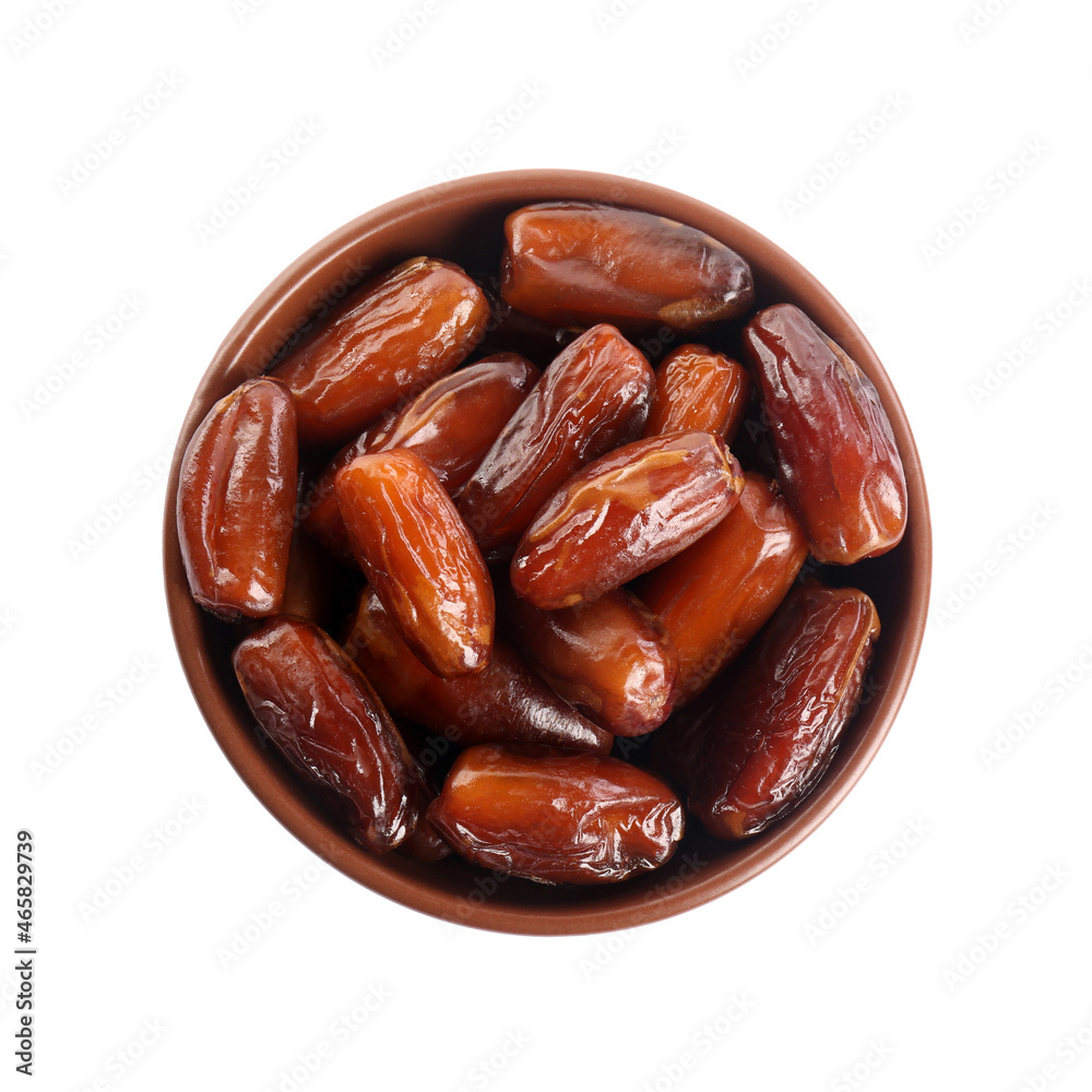 Sweet dried dates in bowl on white background, top view Sweet dried dates in bowl on white background, top view