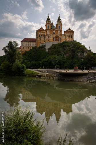 Panorama of famous 11th century Baroque Abbey (Stift Melk) with views of the Danube River on a rocky outcrop, Melk, Austria