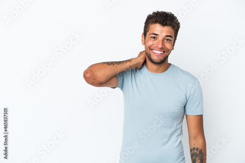 Young handsome Brazilian man isolated on white background laughing