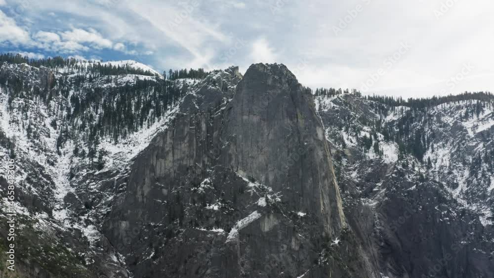 Stunning vista of subalpine natural landscape with granite domes and majestic peaks. Drone footage of the Yosemite wilderness with prominent mountains, covered in snow. High quality 4k footage Stunning vista of subalpine natural landscape with granite domes and majestic peaks. Drone footage of the Yosemite wilderness with prominent mountains, covered in snow. High quality 4k footage