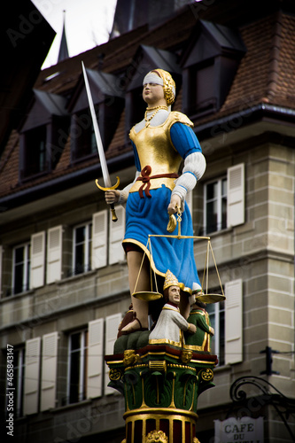 Colorful statue in the Justice Fountain, in the Place de la Palud, Canton de Vaud, Lausanne, Switzerland © Sebastian