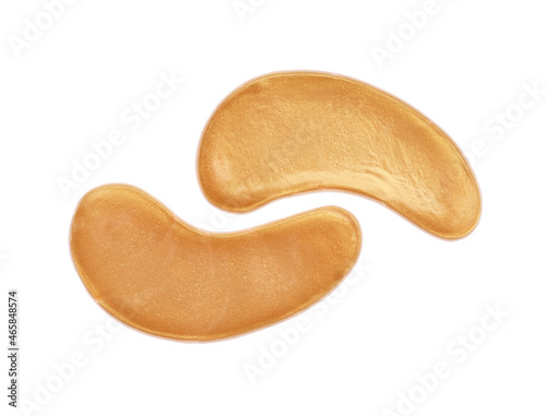 Photo Golden under eye patches on white background, top view