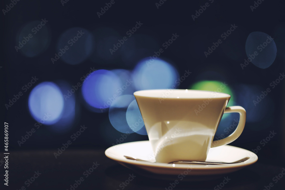 Obraz premium コーヒーカップと夜景
