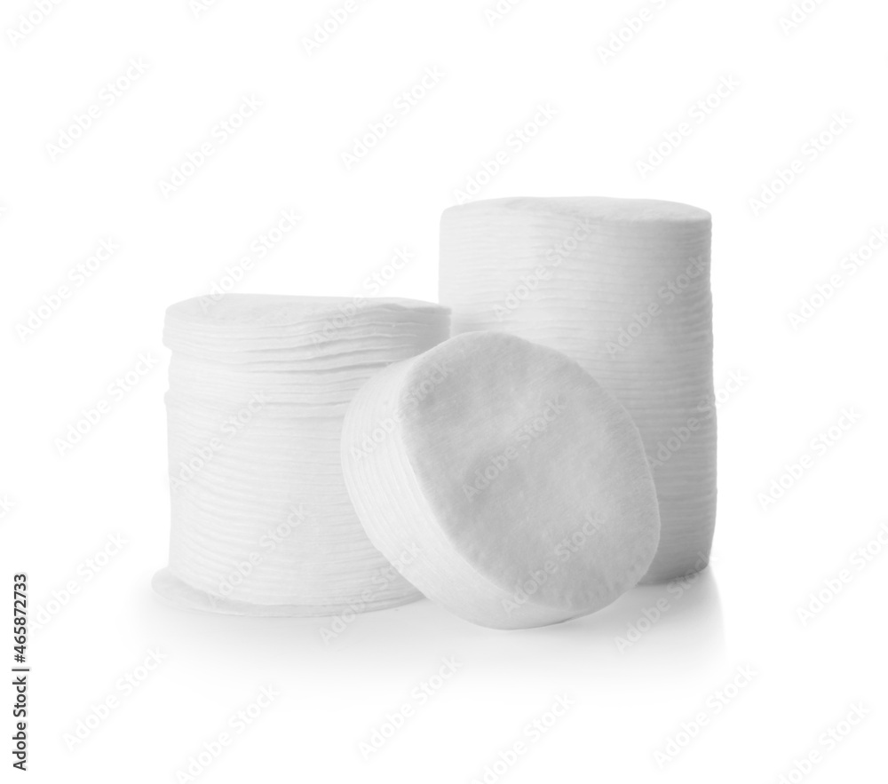 Stacks of round cotton pads on white background Stacks of round cotton pads on white background