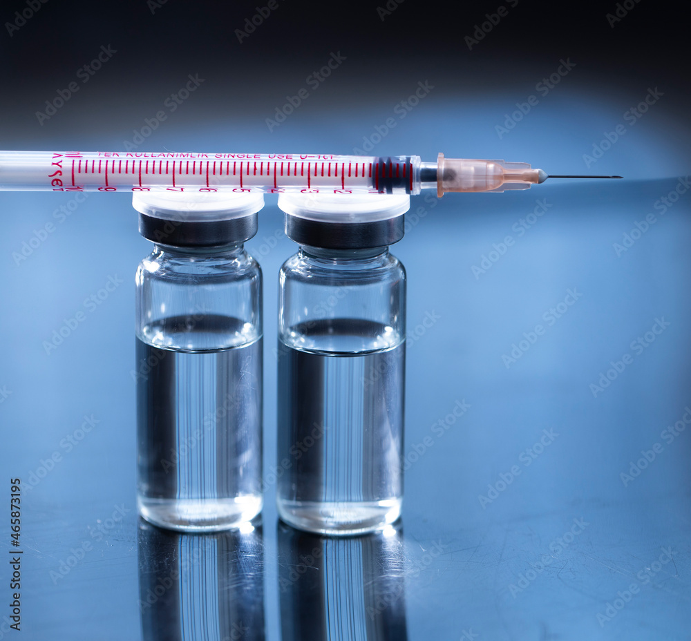Coronavirus Covid-19 vaccine concept. Vaccine bottle. Coronavirus Covid-19 vaccine concept. Vaccine bottle.