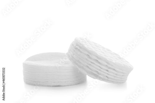Clean cosmetic cotton pads on white background
