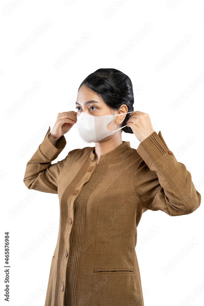 Woman in civil servant uniform wearing mask for health security Woman in civil servant uniform wearing mask for health security
