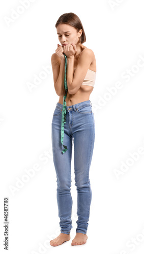 Young woman with measuring ...