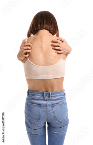 Young skinny woman on white...