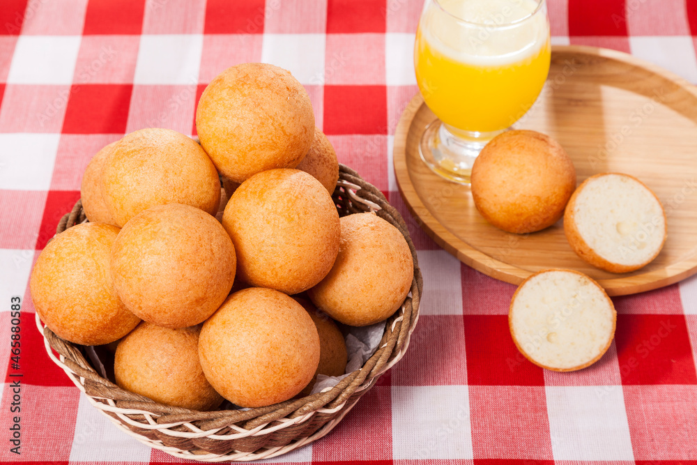 Traditional Food Colombian Buñuelo - Deep Fried Cheese Bread Con cold Drink
