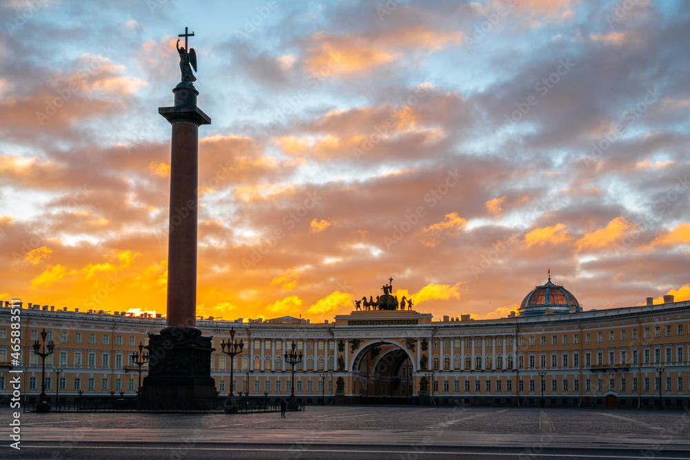 View of the Palace Square, General Staff of the Hermitage and the Alexander Column against the flaming dawn sky in the early morning, St. Petersburg, Russia