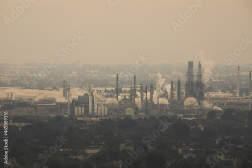 Global warming emissions from oil refining pollute the sky with C02.