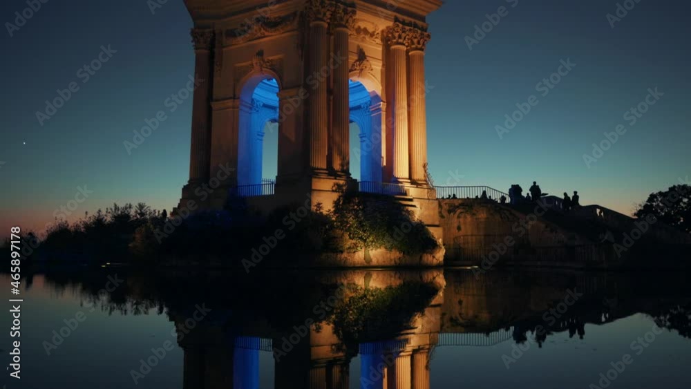 watch the water reflect the Promenade du Peyrou at sunset, Montpellier - France watch the water reflect the Promenade du Peyrou at sunset, Montpellier - France