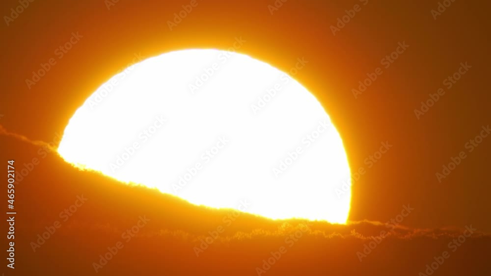 Sun and clouds close up. Nature scene.	
