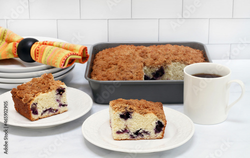 Two slices of blueberry coffee cake