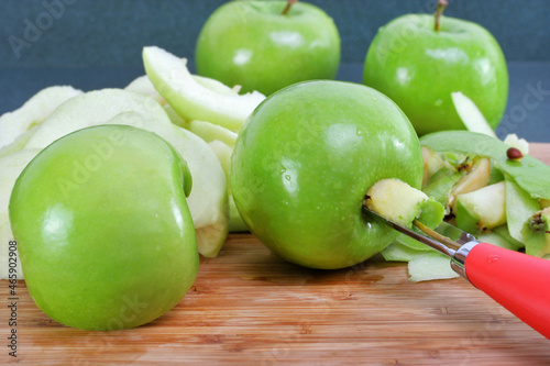 Canvas Print Preparing and coring apples for Pie