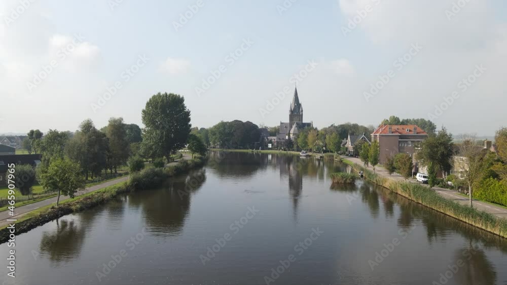 Aerial view of Amstelveen Oudekerk ad Amstel typical dutch landscape and historic village along the Amstel river in The Netherlands. Aerial view of Amstelveen Oudekerk ad Amstel typical dutch landscape and historic village along the Amstel river in The Netherlands.