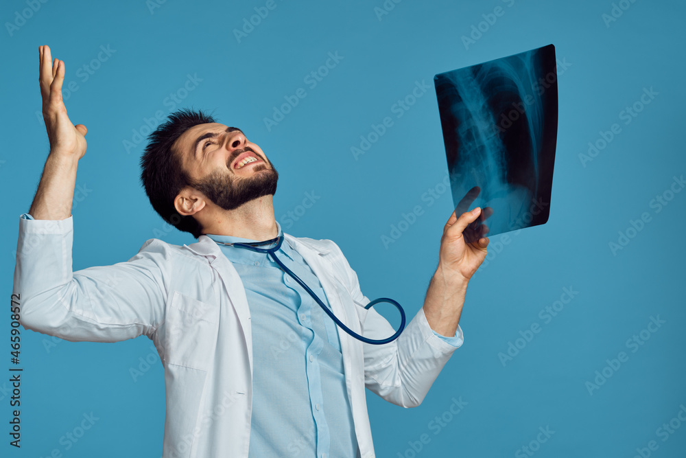 radiologist x-ray examination hospital patient treatment blue background radiologist x-ray examination hospital patient treatment blue background