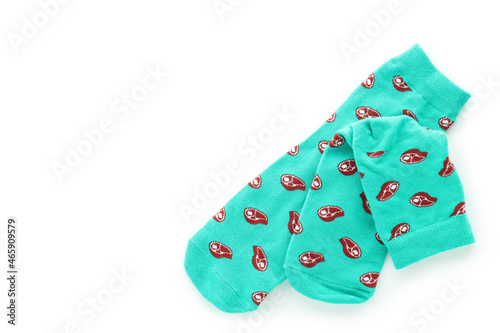 Mint socks with meat slices isolated on white background