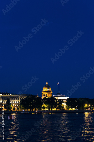 RUSSIA, Saint Petersburg: Scenic sunset cityscape view of the city architecture with Neva river bridges. Evening twightlight St. Isaac's Cathedral architecture 