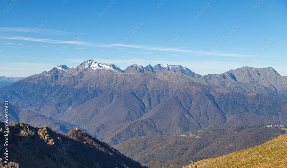Beautiful panorama of the Caucasus mountains on a sunny autumn day Beautiful panorama of the Caucasus mountains on a sunny autumn day