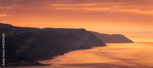 Beautiful October evening sunset from Bossington Hill Exmoor with a view over Porlock Bay, Somerset south west England