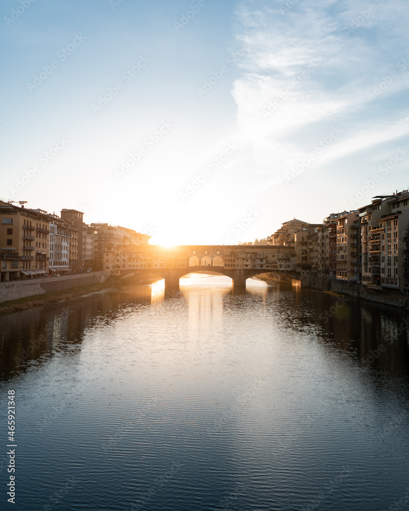 Florence city Ponte Vecchio at sunrise on Arno River, Tuscany.