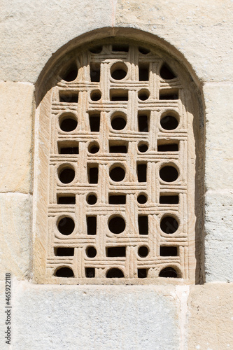 San Salvador de Valdediós, el Conventín. Pre-Romanesque church in Asturian style, Spain, latticework of the south façade photo