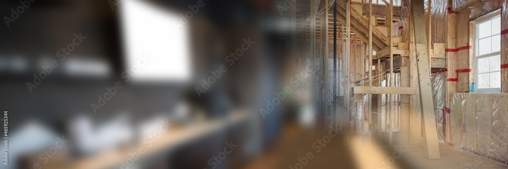 Blurred image of empty corporate office and wooden structures at construction site
