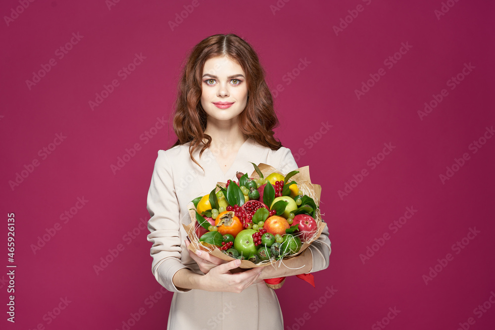 portrait of a woman smile posing fresh fruits bouquet emotions isolated background portrait of a woman smile posing fresh fruits bouquet emotions isolated background