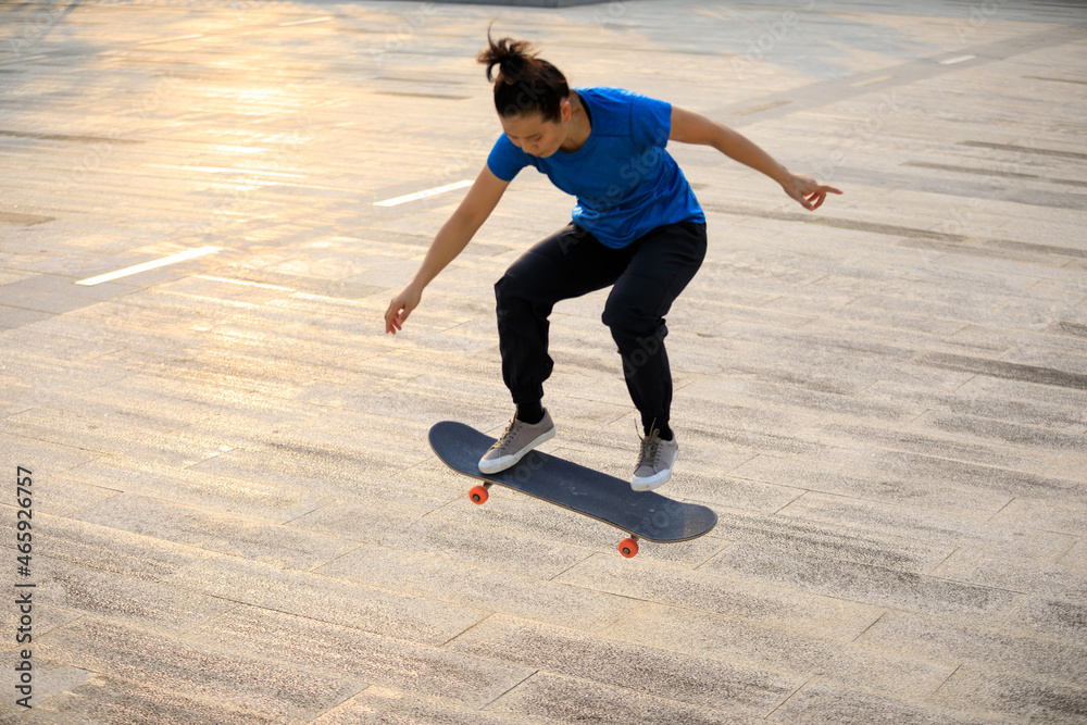 Skateboarder skateboarding outdoors in city Skateboarder skateboarding outdoors in city