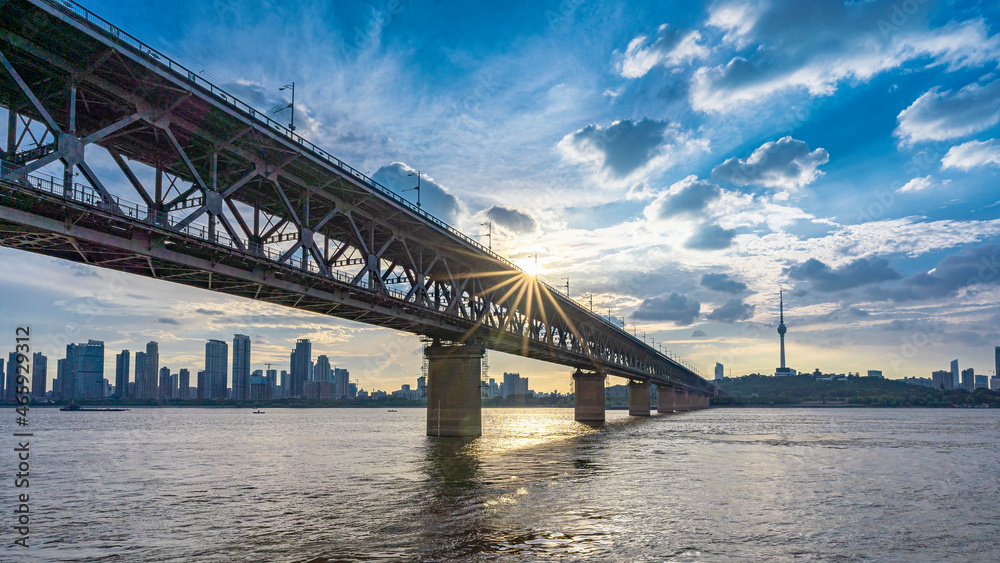 Sunset view from the first steel bridge of Wuhan above Yangtze river Sunset view from the first steel bridge of Wuhan above Yangtze river