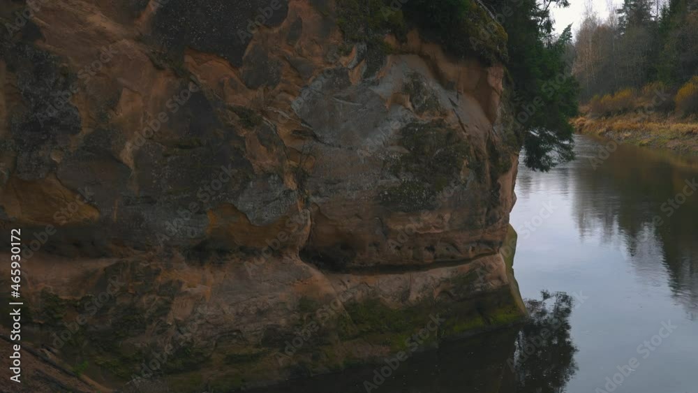 Erglu Cliffs and Great View on the Gauja River Cesis, Latvia. Autumn Landscape Red Rocks Stone Cliff and River at Gauja National Park. Stedicam Dolly Shot 4K. Erglu Cliffs and Great View on the Gauja River Cesis, Latvia. Autumn Landscape Red Rocks Stone Cliff and River at Gauja National Park. Stedicam Dolly Shot 4K.