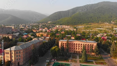 Aerial zoom in view Vanadzor city hall with city buildings panorama in Armenia photo