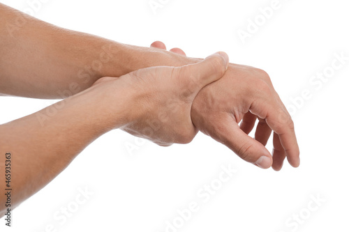 Young european man suffer from wrist pain and pressing hand to sore spot, isolated on white background