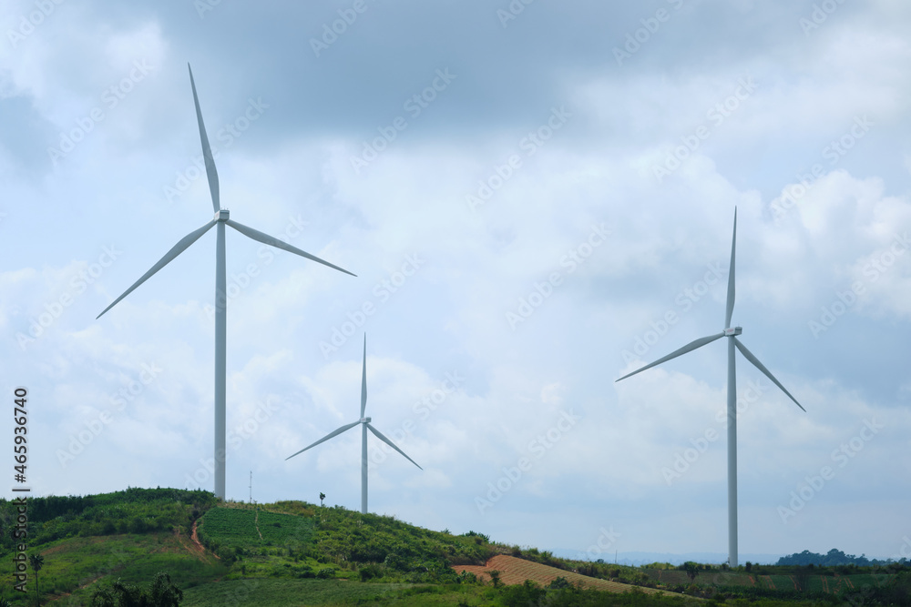 View of a windmill or Wind turbine farm . Renewable energy source. Electricity production . View of a windmill or Wind turbine farm . Renewable energy source. Electricity production .