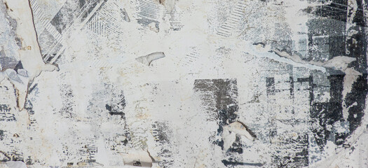 Old white grunge ripped torn collage posters creased crumpled paper placard texture background with copy space for text or image