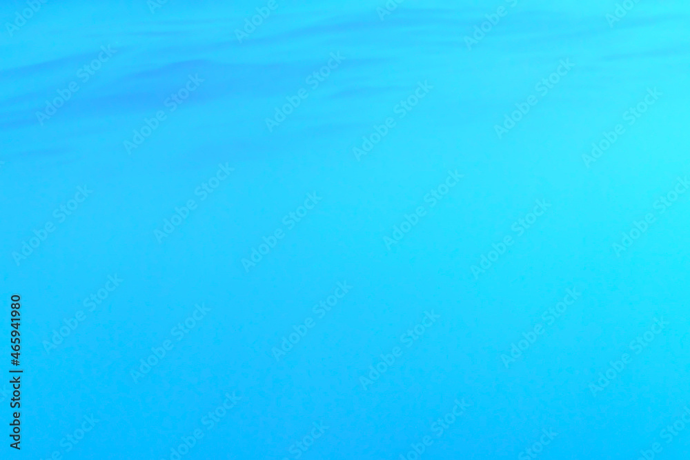 The murky sea water is turquoise in colour. The colour of the sea under the water is smooth. Background for the text. Copy space